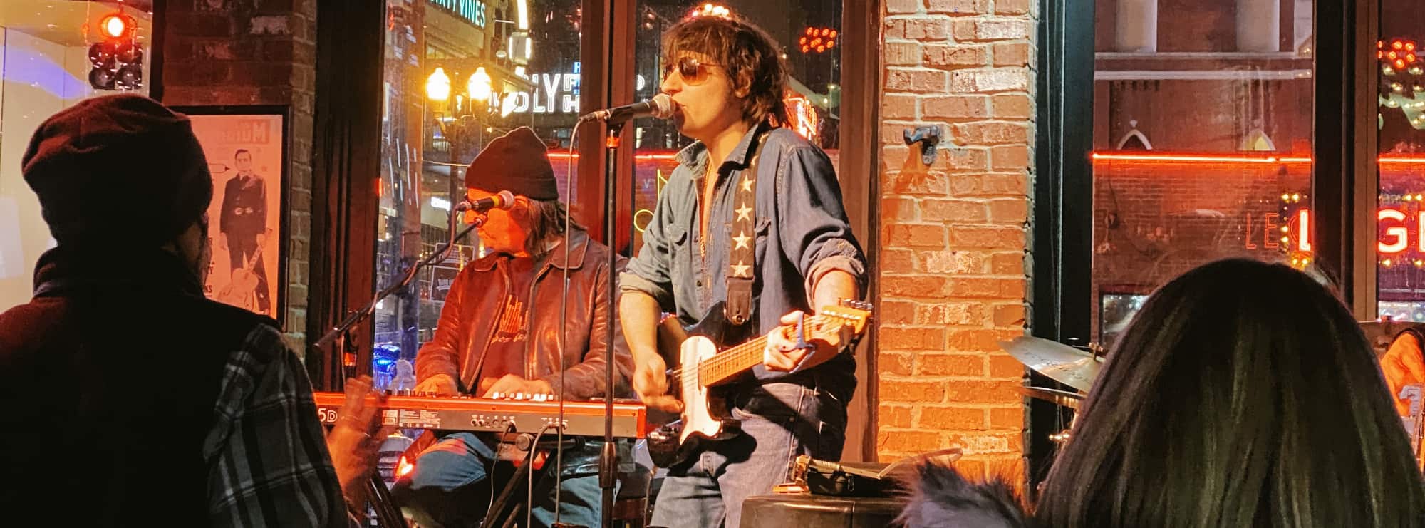 bar singer on guitar in Fort Collins