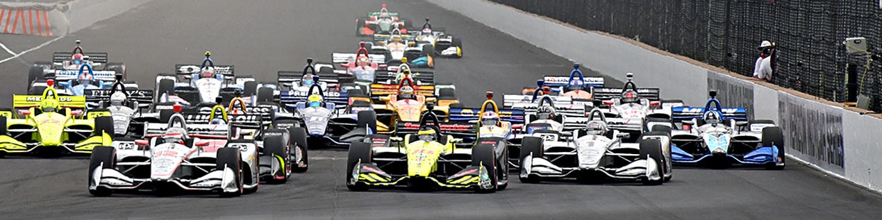 indy cars racing to through the start line Fort Collins